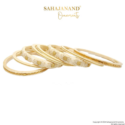 "Ancient Gold Elegance: Cream Bangle Beauty "