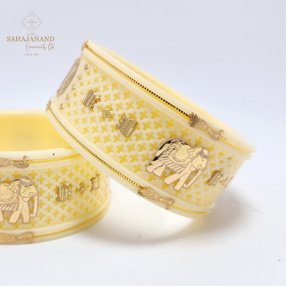 "Exclusive Cream & 916 22 (carats Gold) Elephant-Inspired Bangle"