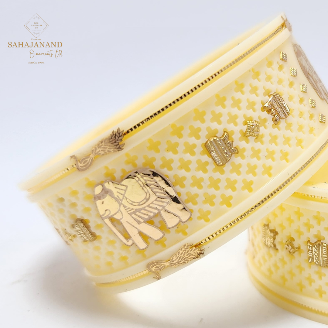 "Exclusive Cream & 916 22 (carats Gold) Elephant-Inspired Bangle"